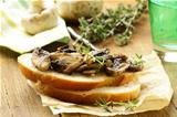 Sandwich crostini  with fried mushrooms and thyme