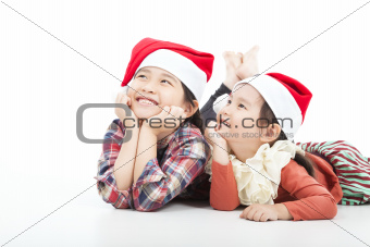 Happy child in christmas hat isolated on white