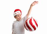 Boy with an oversized Chirstmas Bauble