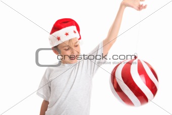 Child spinning large bauble