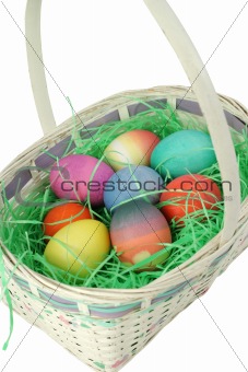 Colored Eggs In White Basket