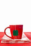 Red cup with tea-bag