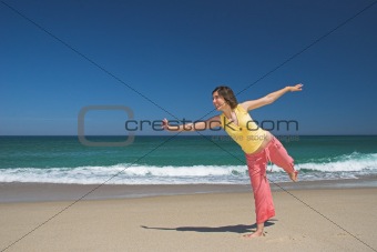 Beautiful woman making poses in the beach