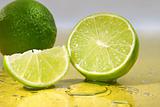 Limes on yellow surface