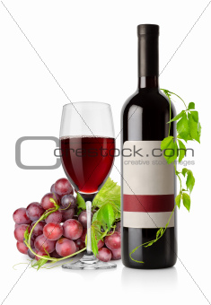 Bottle of red wine and grape