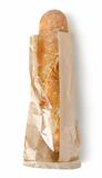 Fresh baguette in a paper bag