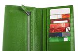 Open green leather wallet with credit cards