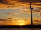 Wind Turbine At Sunrise / Sunset