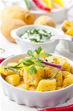 Baked potatoes with sour cream