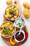 Baked potatoes with chutney and sour cream