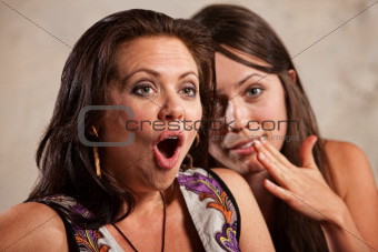 Shocked Woman and Whispering Friend