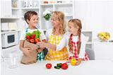 Healthy nutrition concept with people in the kitchen