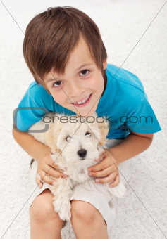 Young boy with his doggy