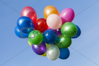 Different coloured balloons in the sky