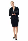 Full length view of an aged female executive