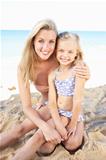 Portrait Of Mother And Daughter On Summer Beach Holiday
