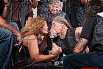 Lovers Kiss While Arm Wrestling