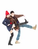 Young happy  couple in winter clothing and isolated on white