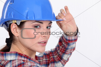 A portrait of a female construction worker.
