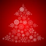 Christmas Background with Christmas Tree made of white Snowflakes