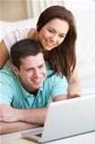 Young couple on laptop computer