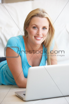 Young woman on her laptop computer