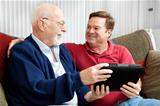 Father and Son Enjoying Tablet PC