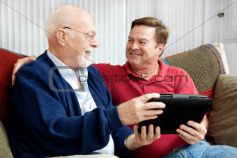 Father and Son Enjoying Tablet PC