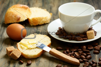 Coffee beans, eggs, bread and butter.