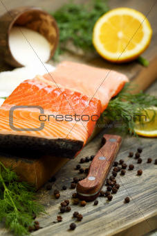 Fresh salmon with black pepper and dill.