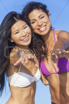 Two Beautiful Women In Bikinis Dancing on Sunny Beach