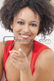 Happy Mixed Race African American Girl Pointing