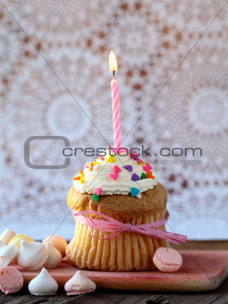 cupcake with  candle and  cream for  birthday