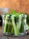 cucumbers in the jar with dill salt and pepper