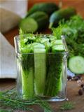 cucumbers in the jar with dill salt and pepper