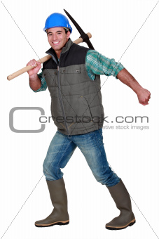 Construction worker with a pickaxe