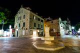 Night Street and Fountain in Makarska, Croatia