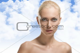 beauty portrait of blonde girl in front of the camera