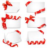 Set of beautiful cards with red gift bows with ribbons