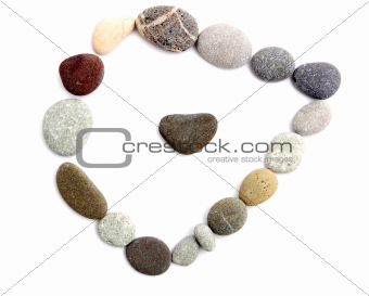 frame of colored sea stones on a white background