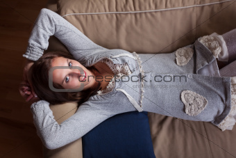 beautiful woman lying on a sofa 