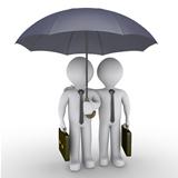 Two businessmen under one umbrella