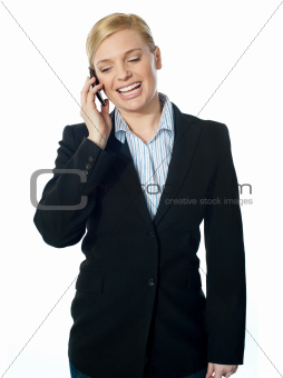 Corporate female communicating on phone