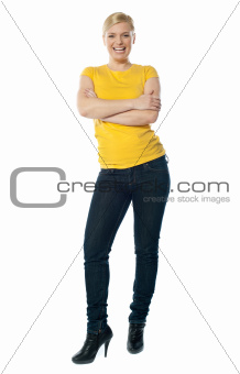 Stylish teenager posing with crossed arms