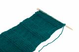 Unfinished scarf on knitting needle