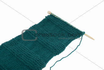 Unfinished scarf on knitting needle