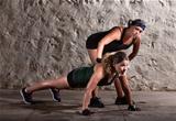 Boot Camp Trainer with Woman