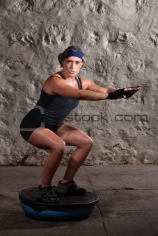 Pretty Lady Doing Balancing Training