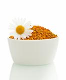 Pollen in a bowl with daisy