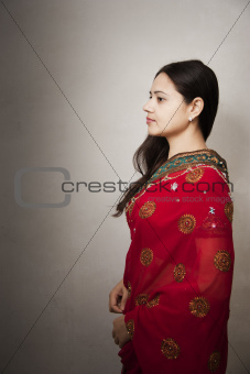 Beautiful Indian happy woman in pink sari